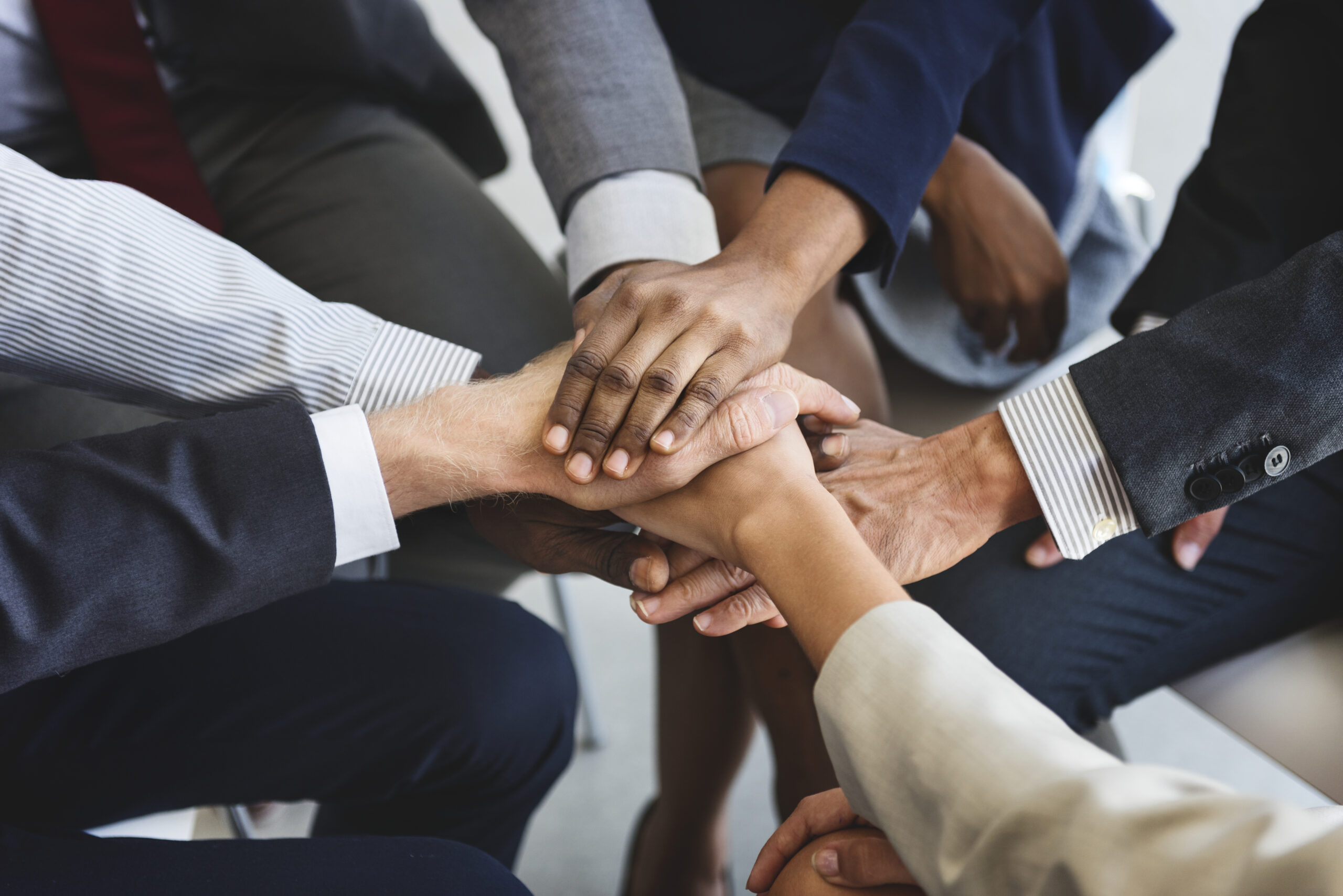 Business people joined hands together as teamwork